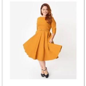 Unique Vintage Plus Size 1950s Mustard Sleeved “Devon” Swing Dress.